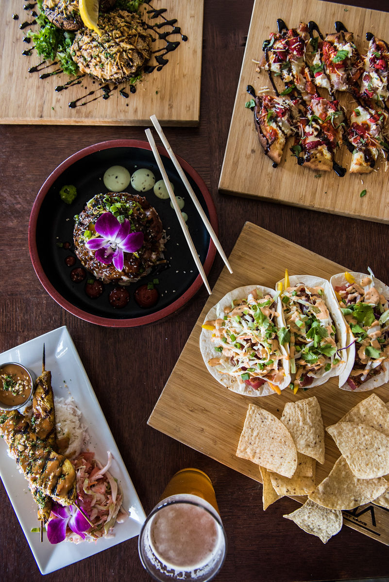 Break-Awayz interior with screens and dining tables